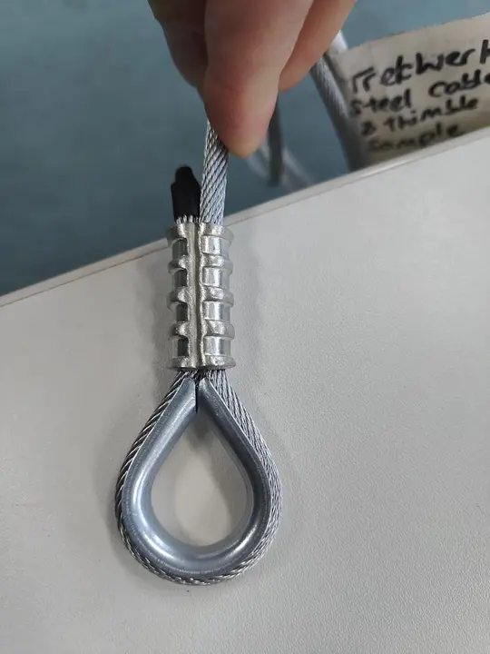 Swaged wire-rope termination with thimble
